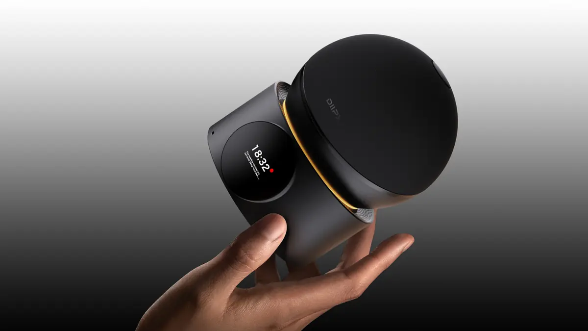 DeskHub D20 held in one hand to show product scale